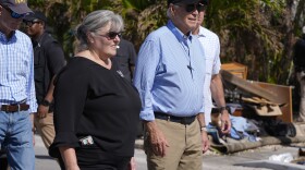 President Biden, right, walks during a tour of areas affected by Hurricane Milton in St. Pete Beach, Fla., following an aerial tour on Sunday.