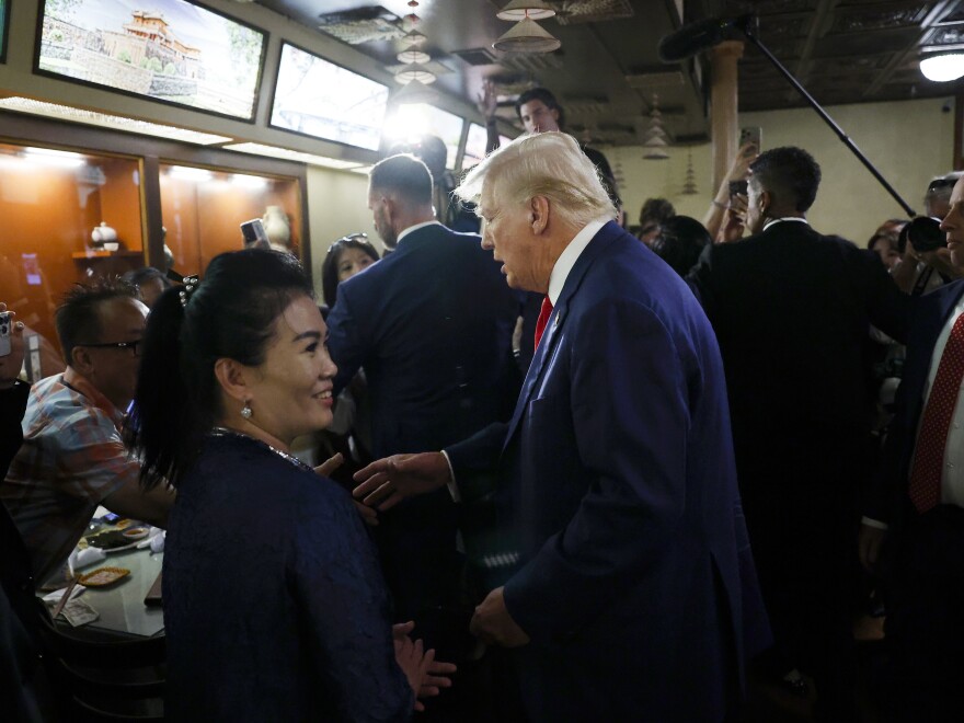 Former President Donald Trump campaigns in the Truong Tien Restaurant in the Eden Center in Falls Church, Va. on Aug. 26.