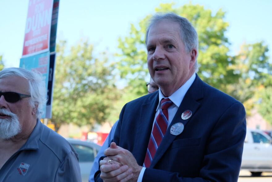 Secretary of State David Scanlan at a polling place in Londonderry.