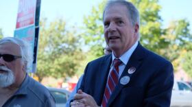 Secretary of State David Scanlan at a polling place in Londonderry.