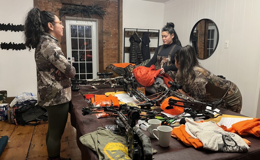 Tracey Campos, Dorothy Ren, and Eliza Rojas get ready to hunt in the early morning.