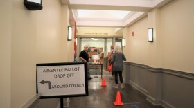 Voters line up at the Manchester City Clerk's office on Oct. 24, 2020.