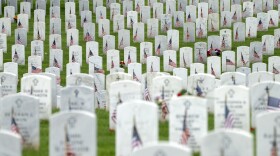 Graves with flags for Memorial Day are seen in Section 60 of Arlington National Cemetery, in Arlington, Va., Monday, May 27, 2024.