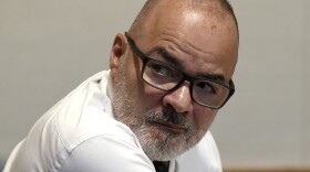 Victor Malavet looks behind him during his trial at Merrimack County Superior Court in Concord, N.H., on Aug. 26, 2024. Malavet, a former state employee is charged in connection with the attorney general’s probe of the Sununu Youth Services Center in Manchester.