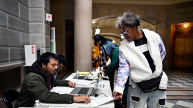 Martina Gordon, who is homeless, registers to vote on the morning of Election Day 2023 at Hartford City Hall. The last time she voted was in the 1992 Presidential Election. Hartford, Connecticut - November 7, 2023.