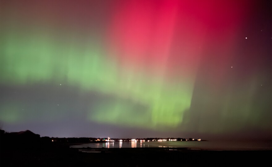 The Northern LIghts, also known as the aurora borealis, light up the sky over Jenness State Beach in Rye, NH, on Oct. 10, 2024. Dan Tuohy photo / NHPR.