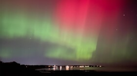 The Northern LIghts, also known as the aurora borealis, light up the sky over Jenness State Beach in Rye, NH, on Oct. 10, 2024. Dan Tuohy photo / NHPR.