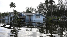 Floodwaters surround a home in the aftermath of Hurricane Helene on Friday in Crystal River, Fla.