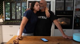 Gal Cohen, the head of Kibbutz Be’eri, stands with his daughter Mia, 22, in their home close to the border with Gaza. They survived the Oct. 7 attack locked in their home’s safe room. Cohen’s goal is to rehabilitate the kibbutz and bring all the survivors back within two and a half years.