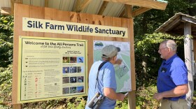 Something Wild's Chris Martin and Dave Anderson review the All Persons Trail at the Silk Farm Wildlife Sanctuary.