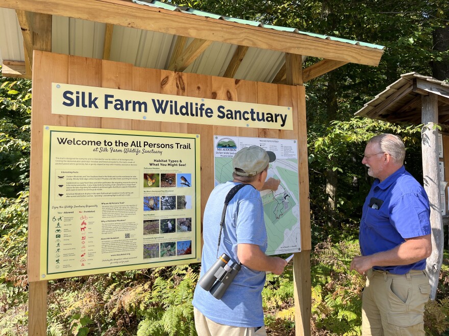 Something Wild's Chris Martin and Dave Anderson review the All Persons Trail at the Silk Farm Wildlife Sanctuary.