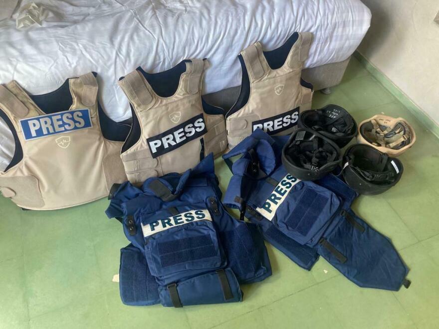 An NPR team's protective vests and helmets in a hotel room in Tel Aviv. (Courtesy of NPR)