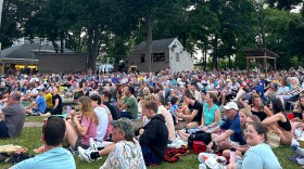 Audience members watch a performance at the Prescott Park Arts Festival in June 2024.