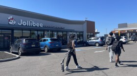 Canvassers with the Asian and Pacific Islander Political Alliance depart from the Jollibee parking lot in Philadelphia on Oct. 5. This Filipino fast food chain has expanded in the United States, reflecting the growing Asian American population.