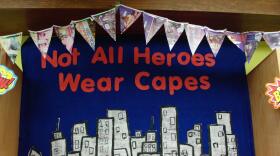 A sign at Goodwin Library in Farmington reads: "Not all heroes wear capes"