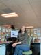 Zoey Knox sits at her desk in NHPR's newsroom