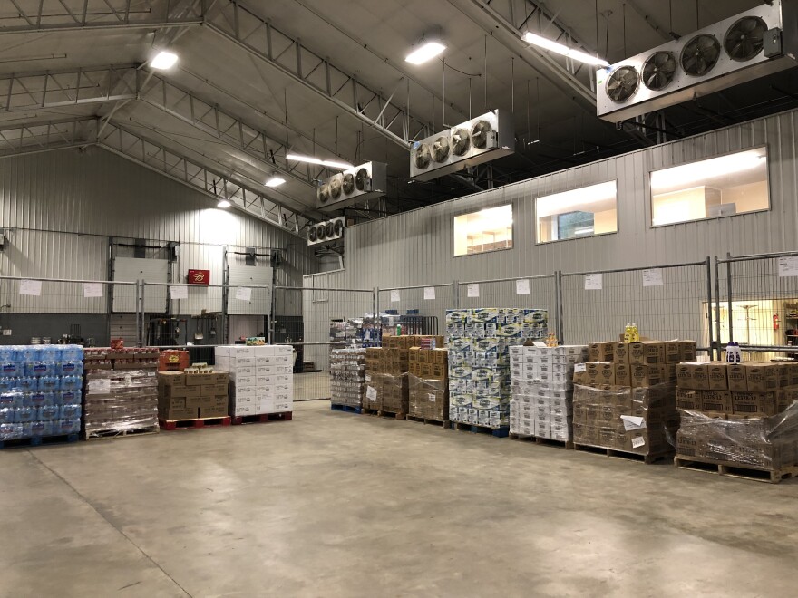 Food and cleaning products are stacked in the Berlin warehouse.