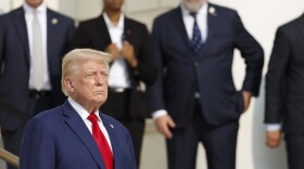 Republican presidential nominee, former President Donald Trump looks on during a wreath laying ceremony at the Tomb of the Unknown Soldier at Arlington National Cemetery on August 26, 2024 in Arlington, Virginia.