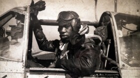 A photograph of Lt. Col. Bertram W. Wilson in his aircraft as a Tuskegee Airman is on the wall of the home office of former Connecticut state representative Pat Wilson Pheanious, mother of