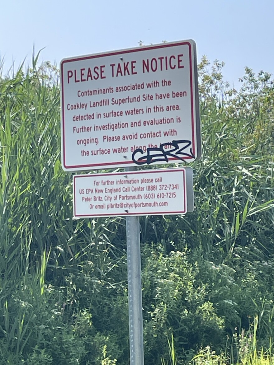 One of the public health signs along the Seacoast Greenway trail in Greenland, NH. Dan Tuohy photo / NHPR