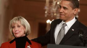 President Barack Obama stands with Lilly Ledbetter before signing the Lilly Ledbetter Fair Pay Act during an event in the East Room of the White House on Jan. 29, 2009.