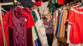 Ursula Boschet, 90, owner of Ursula’s Costumes, browses through the handmade costumes in her shop.