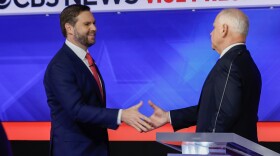 Minnesota Gov. Tim Walz and Ohio Sen. JD Vance shake hands after the vice presidential debate at the CBS Broadcast Center on Tuesday in New York City.