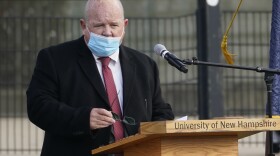 New Hampshire House Speaker Dick Hinch speaks on Dec. 2 during an outdoor legislative session at the University of New Hampshire in Durham, N.H. Hinch died of COVID-19 on Dec. 9, just a week after he was sworn in as leader of the state's newly Republican-led House. He was 71.