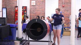 Julia Levreault from the SEE Science Center in Manchester demonstrates an air cannon at a celebration of Hispanic Heritage Month on Friday, Oct. 4, 2024.