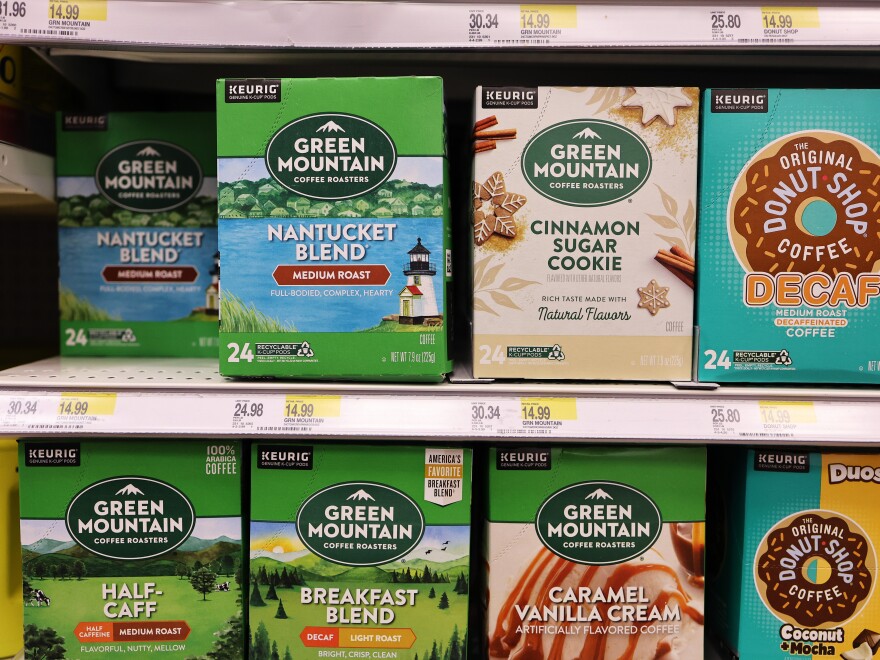 Boxes of Green Mountain Keurig coffee K-Cup pods are seen on display at a Target store. The Securities and Exchange Commission has announced that they are charging Keurig Dr Pepper over inaccurate claims made by the company about the recyclability of its disposable K-Cup pods.