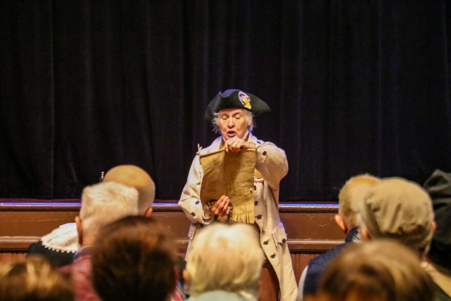 Town crier Kathy-Ann Becker of Wendell, Massachusetts.