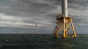 The five turbines of America's first offshore wind farm, owned by the Danish company, Orsted, stand off the coast of Block Island, R.I., Monday, Oct. 17, 2022. Hundreds of offshore wind developers and experts gathered in Rhode Island to talk about the future of clean energy— how to grow the offshore wind industry and address shared challenges. (AP Photo/David Goldman)