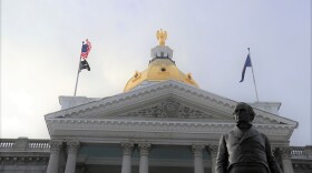 NH Statehouse and Daniel Webster Statute