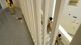 Inmates at the Cook County, Ill., jail head to a staging area at the jail's Division 11 law library before registering and voting in the local election in 2023 in Chicago.