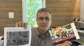 Patrick Tate shows off a hoax submitted to Fish and Game. A New Hampshire resident claimed they got a trail camera picture of a mountain lion and her cub, but Tate soon found the image online.