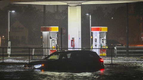 A vehicle is stranded on a water-flooded street after Hurricane Milton made landfall in Brandon, Florida on Oct. 9, 2024.